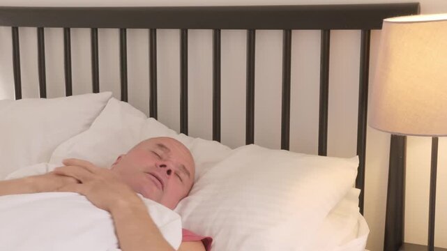 senior man rests deeply, eyes closed and face serene, Nighttime struggles, sleep disruption, anxiety in older adult, quiet moment true rest, reminding healing begins body finally surrenders to sleep