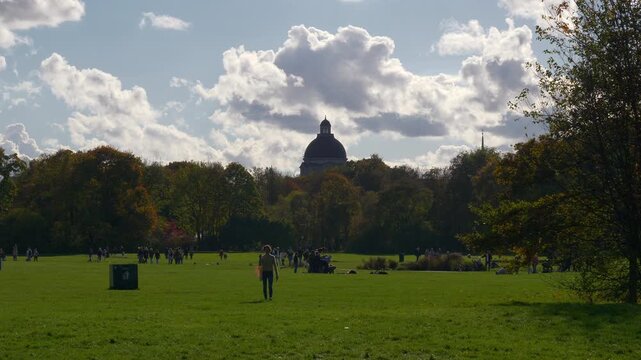 day time sunny weather munich city central park meadow slow motion panorama 4k germany 