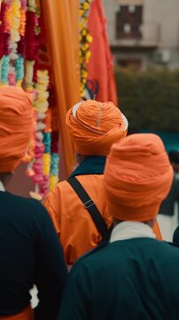Indian prayer to the Sikh guru near the chariot with the sacred text the square