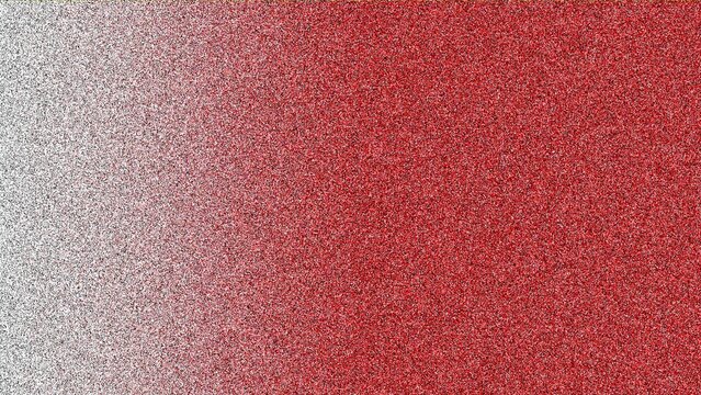 Close-up texture of vibrant red granular surface on gray concrete background