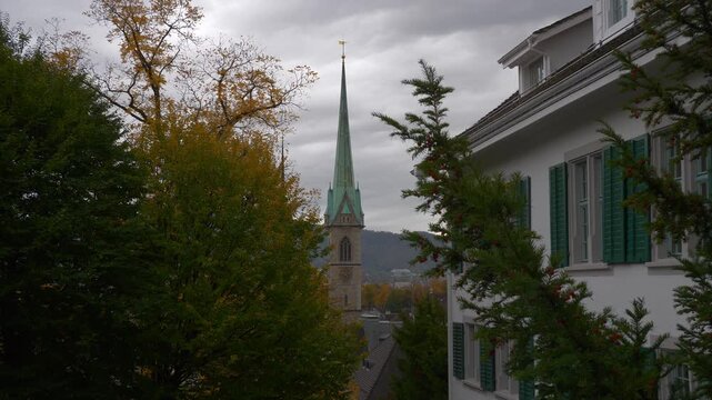 day time zurich city center famous church exterior slow motion top panorama 4k switzerland