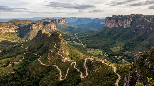 Serra Do Cip&oacute; National Park Brazil with winding hiking trails and dramatic table top mountains under a cloudy sky