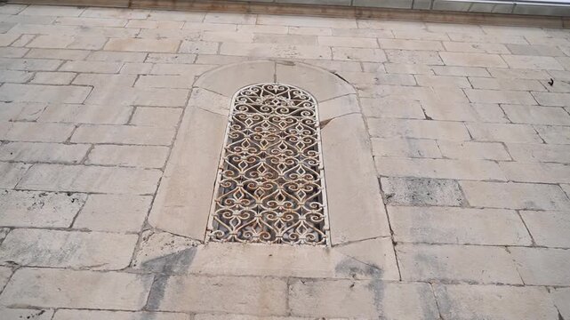 Image capturing old stone window with elaborate surface details