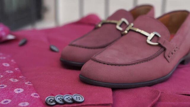 Highquality leather loafers paired with elegant silk accents
