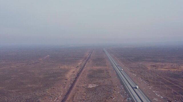 Desert road aerial view from drone. Aerial view of a deserted road from a drone
