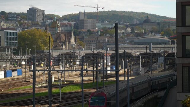 day time zurich central cityscape train station traffic rooftop slow motion panorama 4k switzerland