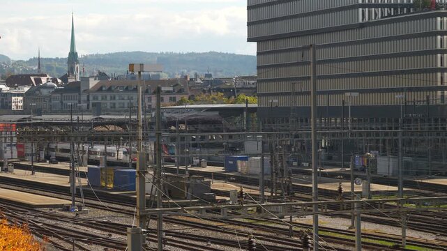 day time zurich central cityscape train station traffic rooftop panorama 4k switzerland