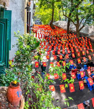 National flags of Vietnam,hanging above the streets of Hanoi,Vietnam.