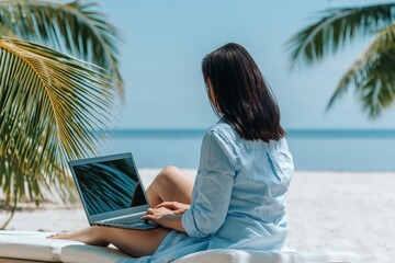 Fototapeta premium Woman working on laptop on tropical beach, remote digital nomad lifestyle by ocean