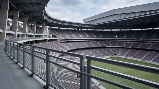 Sturdy Protective Guardrails Lining Upper Deck Overlooking Massive Empty Sports Stadium Seating Row Area Arena