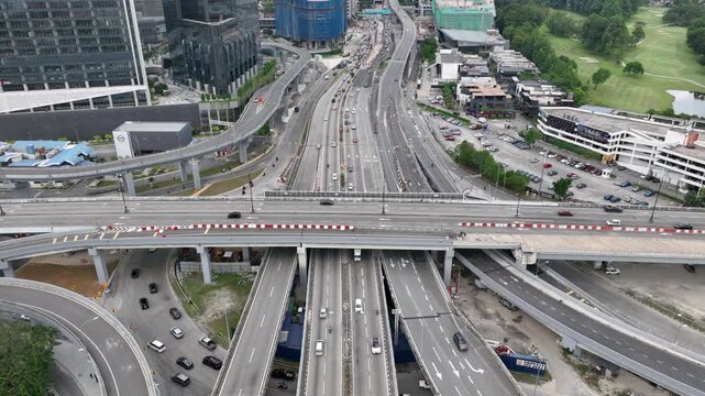 day time kuala lumpur city traffic street road interchange aerial topdown panorama 4k malaysia  