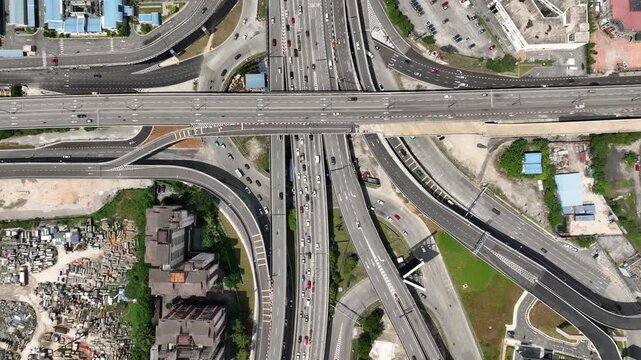 sunny day kuala lumpur city traffic street road interchange aerial topdown panorama 4k malaysia  
