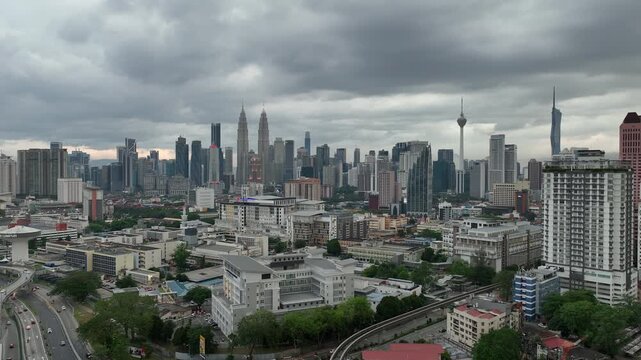 twilight time illumination kuala lumpur city downtown district traffic road interchange aerial panorama 4k malaysia    
