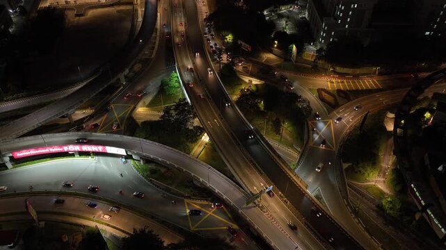 night time illumination kuala lumpur city traffic street road interchange aerial topdown panorama 4k malaysia  