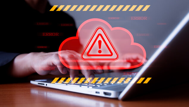 Cloud outage. Incident within cloud infrastructure. Application service unavailable. Businessperson using laptop computer.