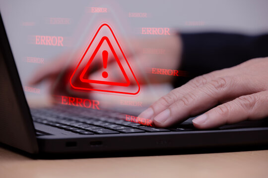 The concept of system errors and notifications involves displaying a red warning icon on the laptop screen, symbolizing data failure, bugs, or other errors.
