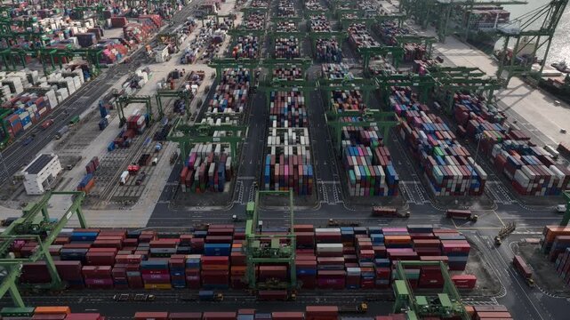 day time flight over famous singapore city port container terminal traffic aerial panorama 4k    