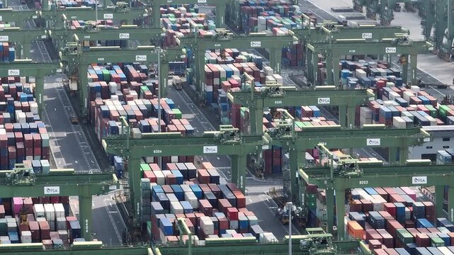 day time flight over famous singapore city port container terminal traffic aerial panorama 4k    
