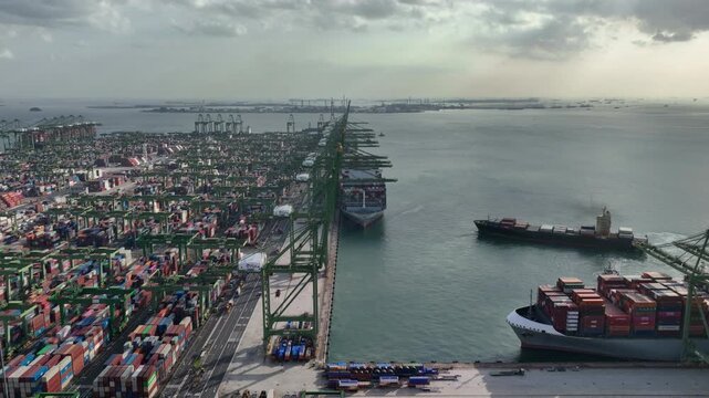 sunny day singapore city port terminal container ship dock loading bay traffic aerial panorama 4k    