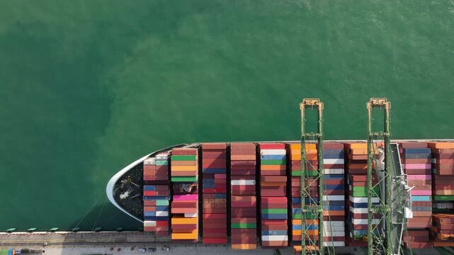 day time singapore city port terminal colorful container ship dock bay aerial topdown panorama 4k    