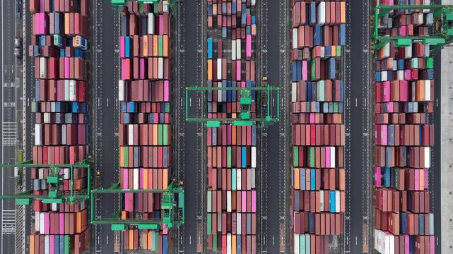 day time singapore city container terminal working traffic topdown aerial panorama 4k    