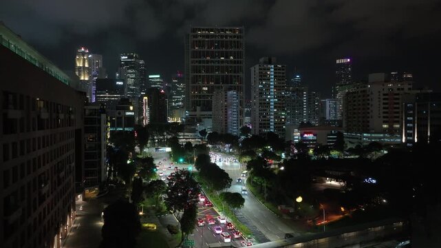 night time illumination singapore city center traffic street aerial panorama 4k 