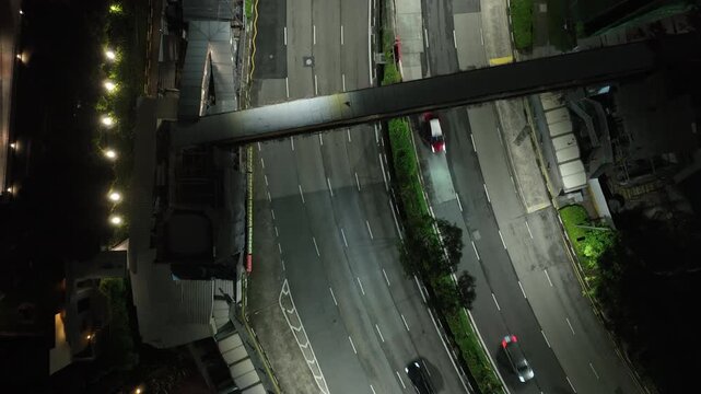 night life time singapore city center traffic street aerial topdown panorama 4k 