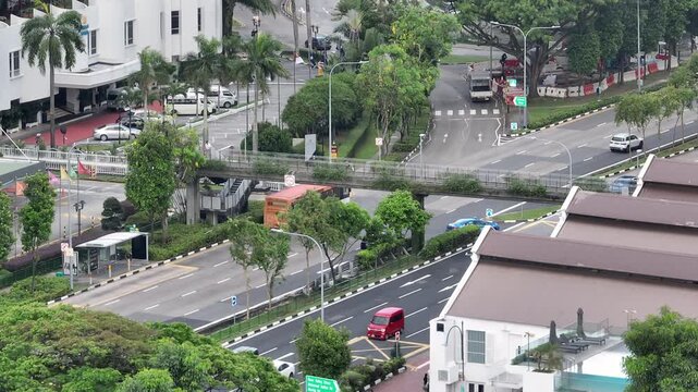 day time singapore city center traffic street road pedestrian walking bridge aerial panorama 4k 