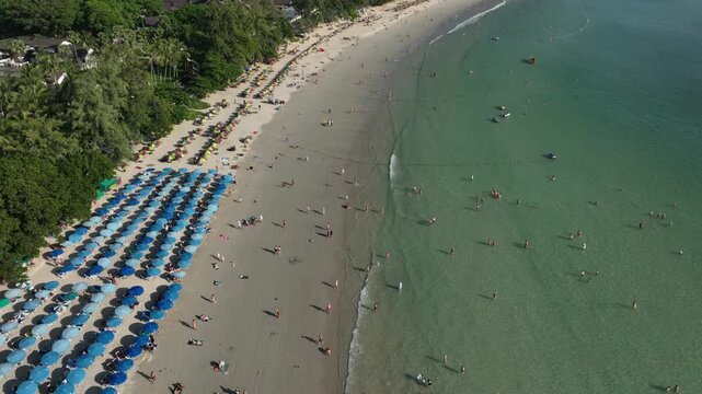 day time phuket island famous kata crowded beach bay aerial panorama 4k thailand