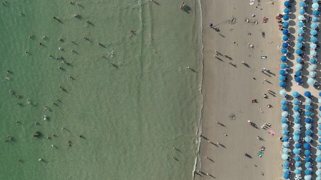day time phuket island famous crowded beach bay coastline aerial topdown panorama 4k thailand