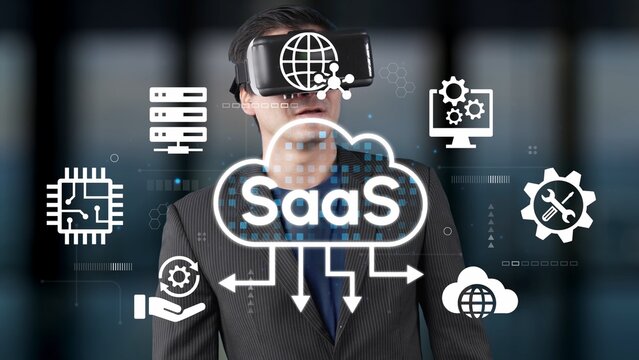 Businessman in Virtual Reality Environment Exploring Cloud Solutions with SaaS Concept and Digital Technology Icons for Future Innovation. Entropy.