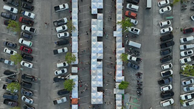 sunset time phuket island famous store parking sunday market aerial topdown panorama 4k thailand
