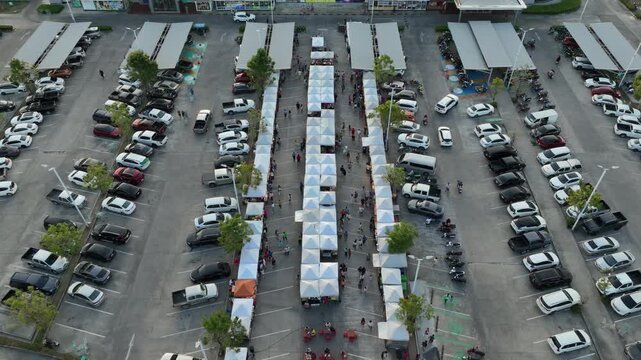 sunset time phuket island famous store parking sunday market aerial panorama 4k thailand