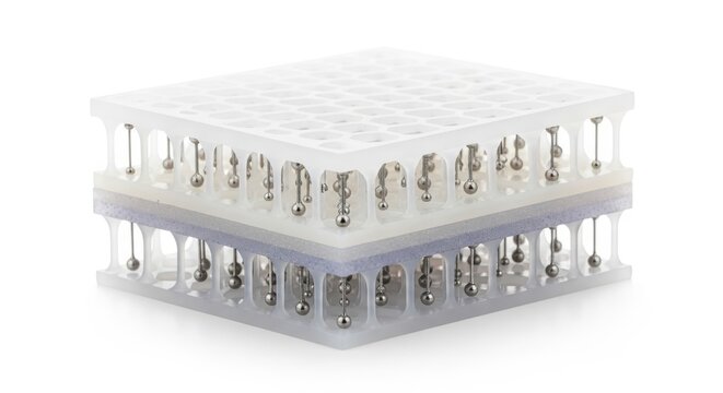 Stacked plastic microchip carriers, electronic components, white and gray, microelectronics