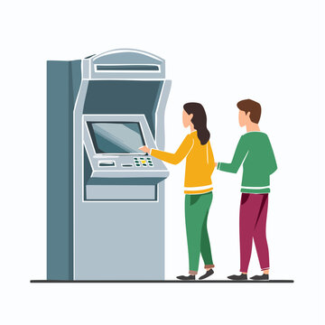 People using an ATM machine