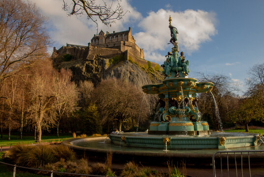 Ross Fountain and Edinburgh Castle Above Princes Street Gardens in Winter Sun, Edinburgh Scotland