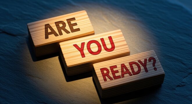 Wooden Blocks Spell Out 'Are You Ready?' Question, Inspiring Motivation and Preparedness