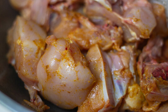 chicken meat seasoned with typical Indonesian "bumbu kuning"