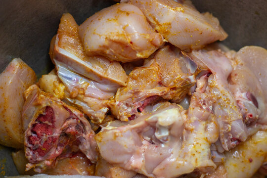 chicken meat seasoned with typical Indonesian "bumbu kuning"