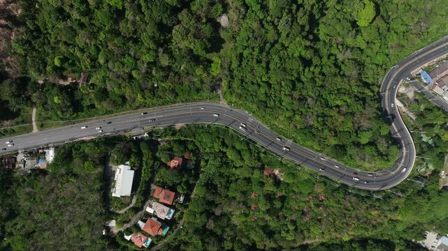 sunny day phuket island traffic mountain road aerial topdown panorama 4k thailand 