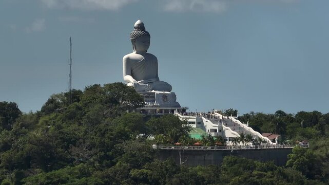 sunny day phuket island famous crowded mountain top big buddha monument front aerial panorama 4k thailand