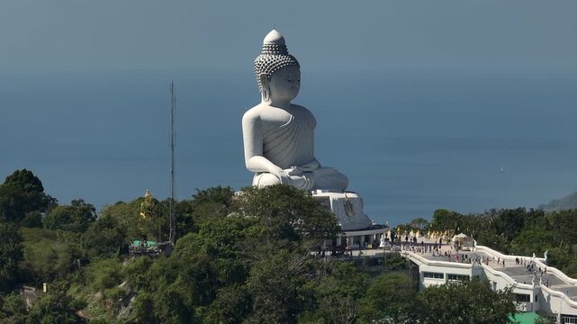 sunny day phuket island famous crowded mountain top big buddha monument front aerial panorama 4k thailand