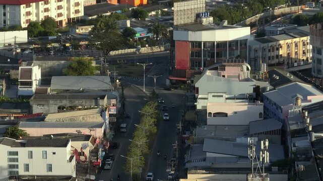 sunset time light phuket town city center traffic street aerial panorama 4k thailand