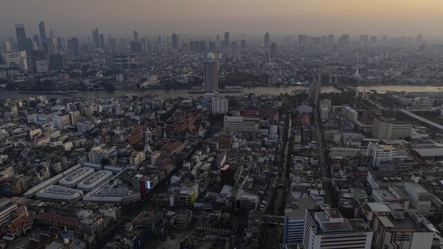 sunset time bangkok city riverside district area traffic aerial panorama 4k timelapse thailand