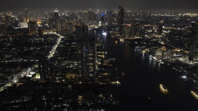 night life illumination bangkok city traffic river famous ferris wheel asiatique bay park aerial panorama 4k timelapse thailand