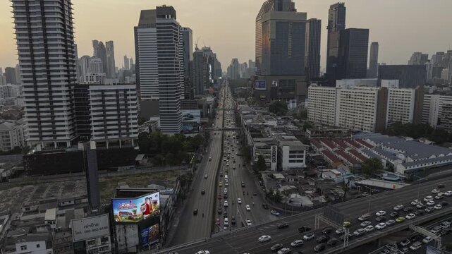 twilight time bangkok city center traffic street crossroad overpass aerial panorama 4k timelapse thailand 