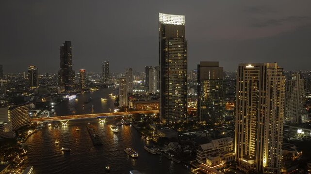 twilight time sunset sky bangkok city center famous riverside traffic aerial panorama 4k timelapse thailand  