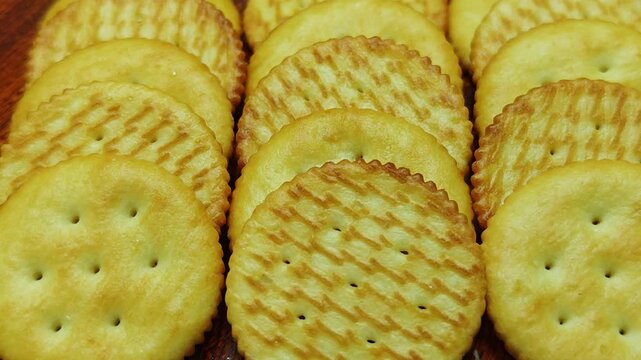 Golden round cracker isolated  crispy baked snack for appetizers and healthy eating 