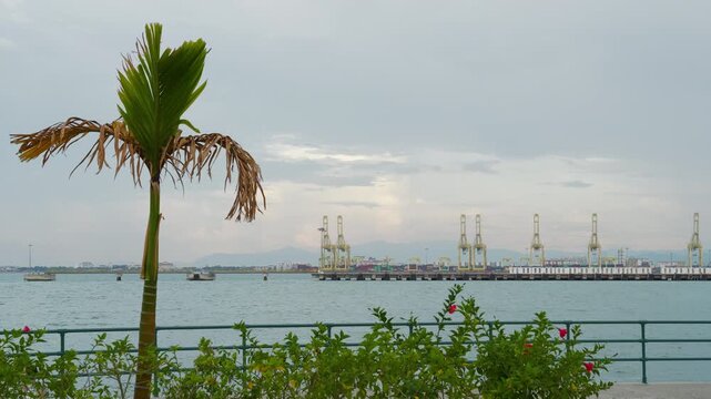 rainy day penang island gorge town city bay industrial port district slow motion panorama 4k malaysia