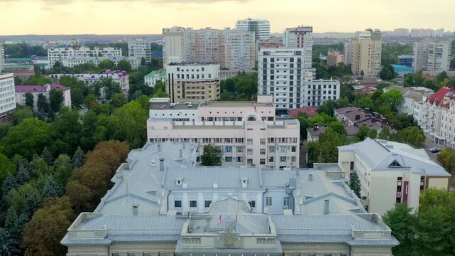 Krasnodar, Russia. Legislative Assembly of Krasnodar. The text on the building translated into English is the Legislative Assembly. Drone footage, Departure of the camera